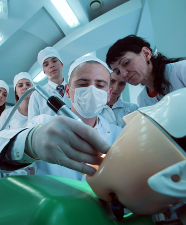 Dental student in class